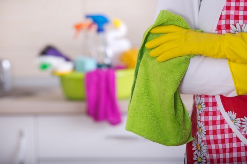 Local technician removing dust and stains from a mattress