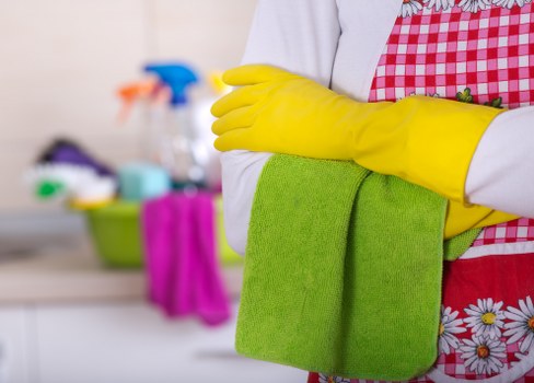 Local cleaning team preparing a home for move in around E11